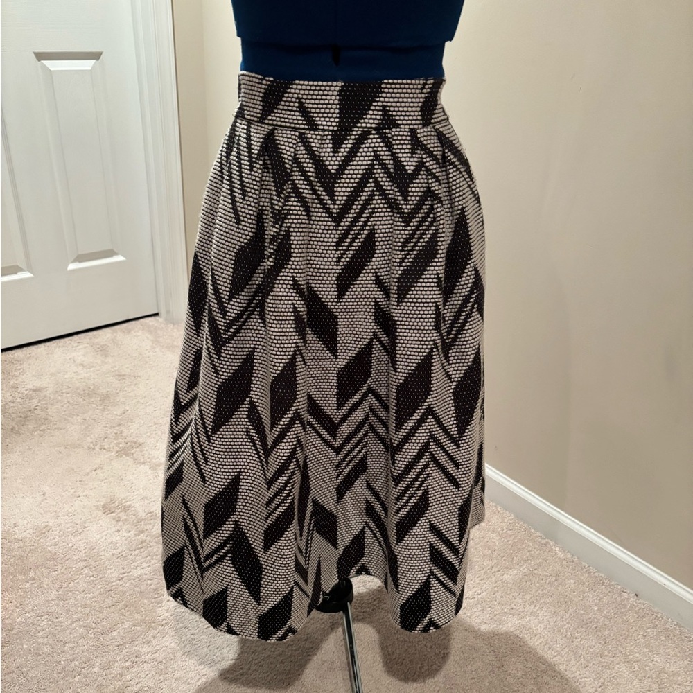 New York & Company Eva Mendez Black and White/Tan pleated skirt.